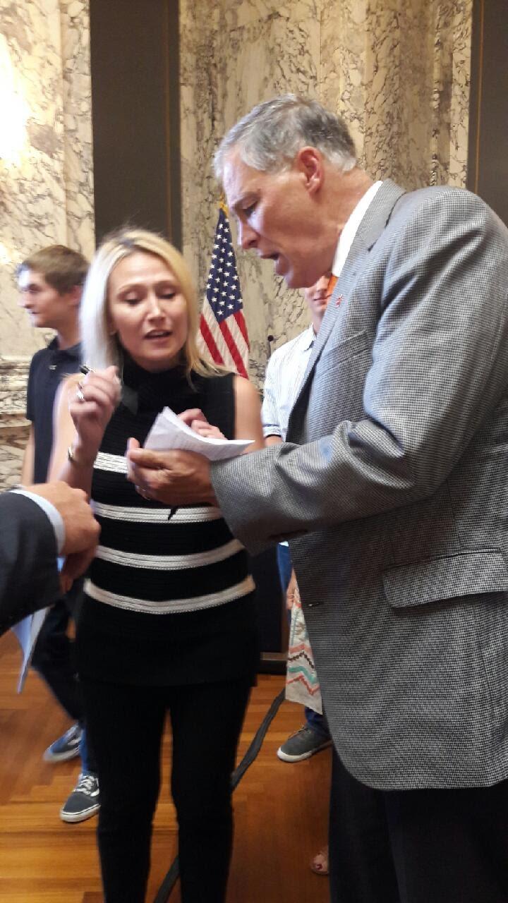 Lily Wilson-Codega with former Washington State Governor Jay Inslee