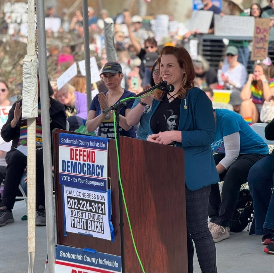 defend democracy mary fosse at podium