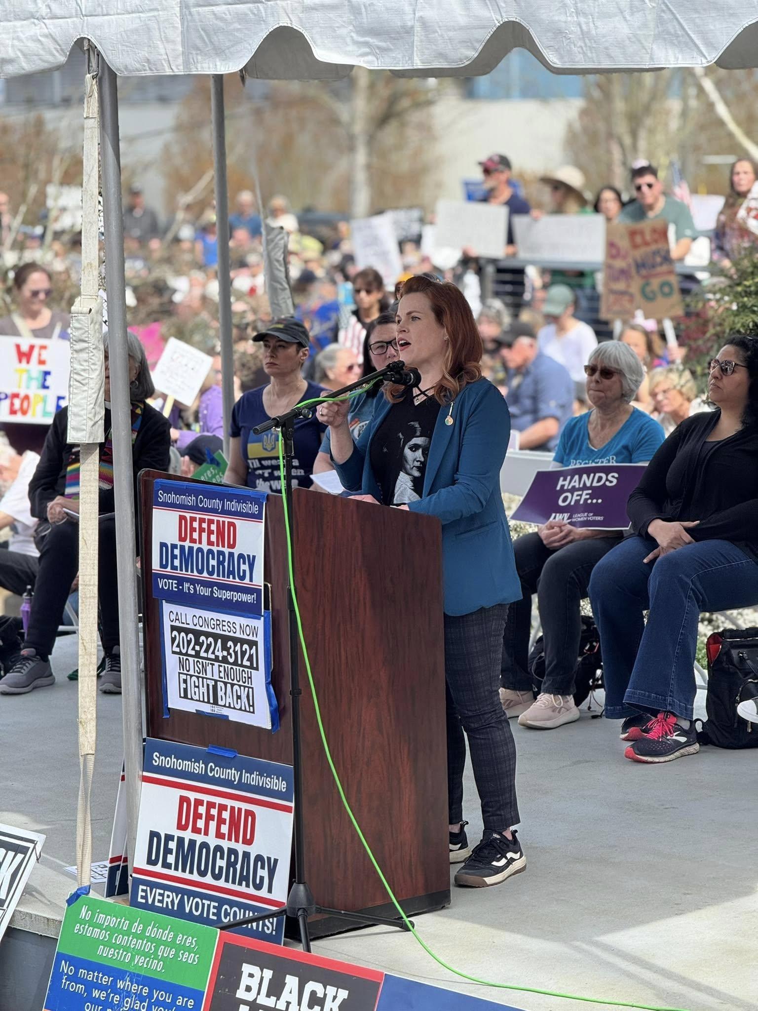 defend democracy mary fosse at podium