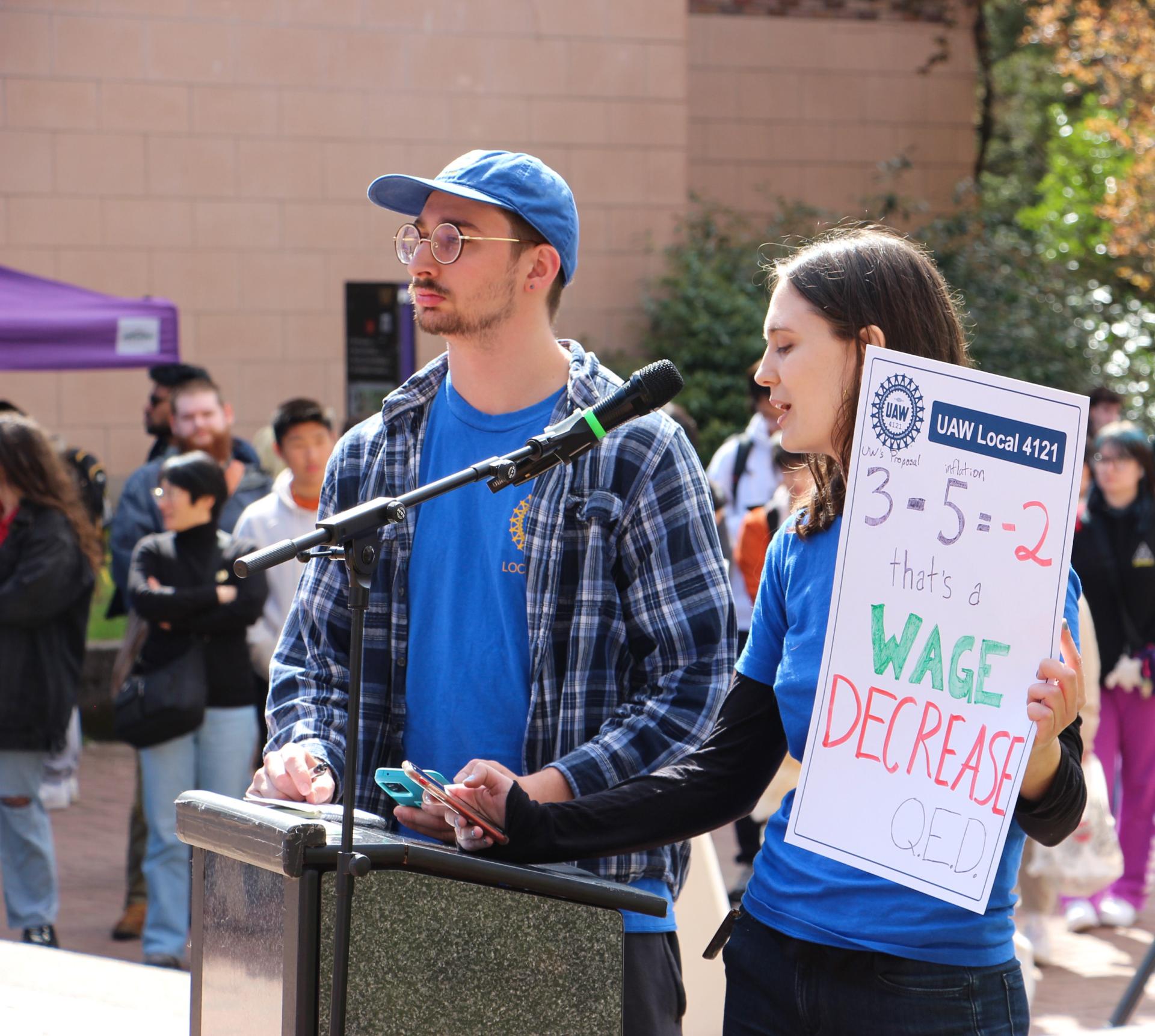 ASEs speaking at the podium